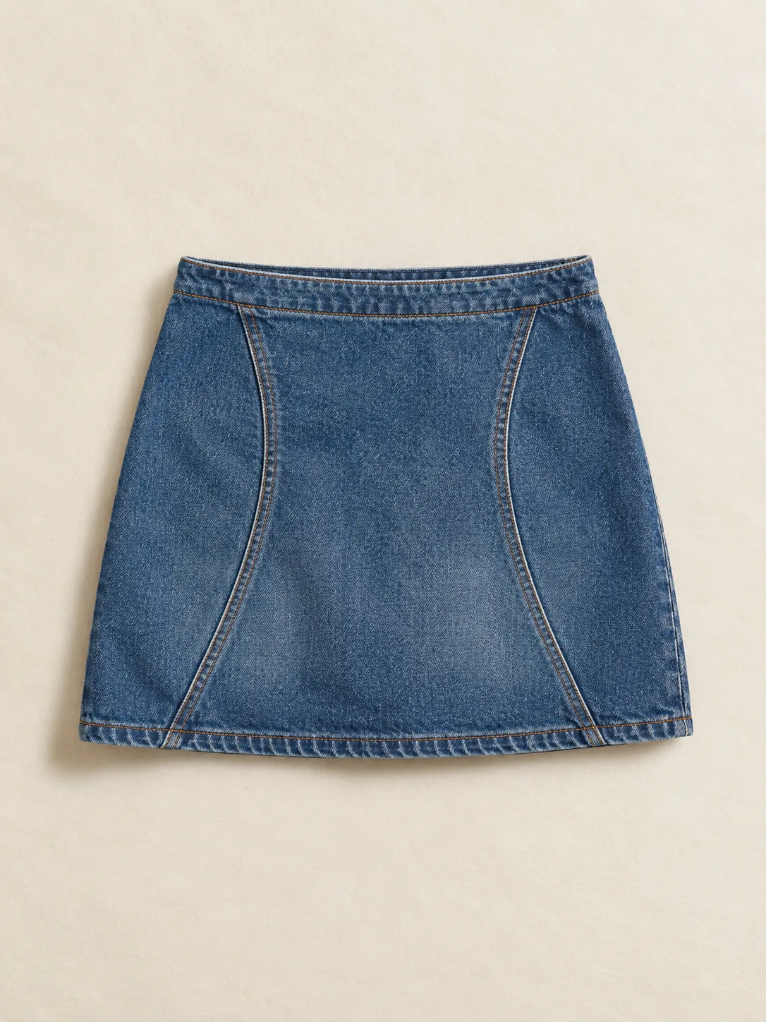 Curve Seam Mini Skirt in Mid Worn wash, front view