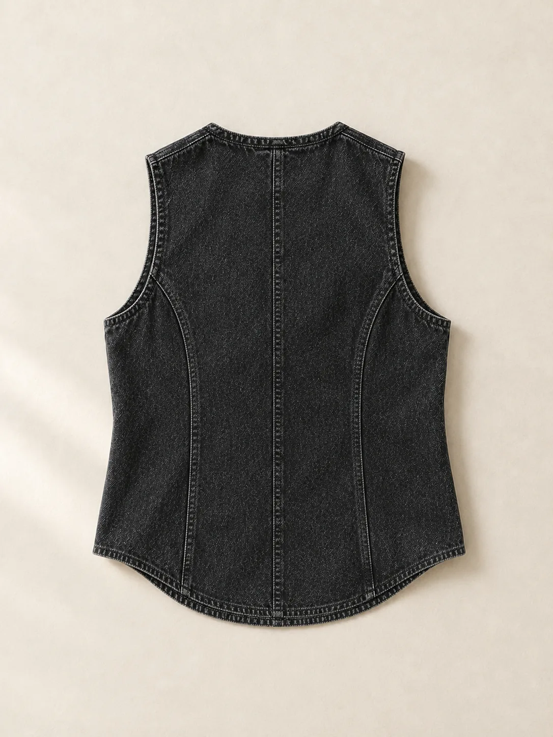 Worn Black Shirttail Vest in Worn Black wash, back view